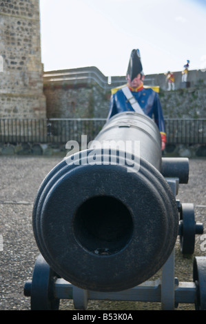 Cannon on trolley  with fibre-glass mannequin of a British soldier Stock Photo