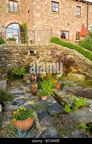Dry wall rockery garden wall plants Stock Photo - Alamy