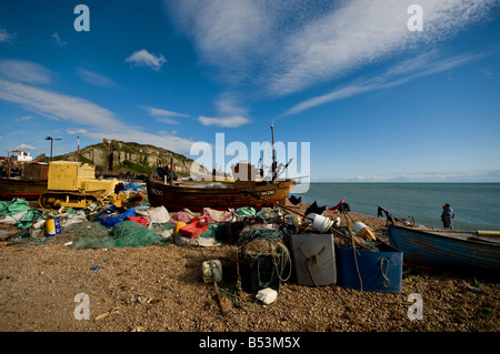 Fishing boats beached on the Stade at Hastings in Sussex. Stock Photo