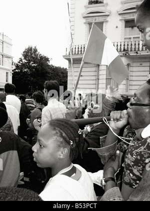 Crowds in the procession at the Notting Hill Carnival, London Stock Photo