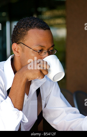 An confident and successful African American businessman in a power suit Stock Photo