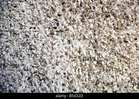 Rough Pebbledashed Wall for Use as a Background Stock Photo
