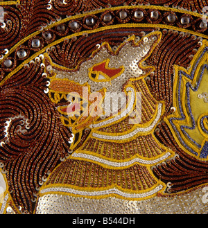 Burmese crafts sequinned Mandalay tapestry detail from Burma Myanmar Stock Photo