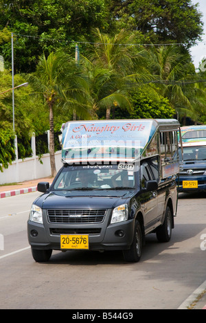 Traditional “Tuktuk” taxis, Shared Mobile open-air, passenger vehicle, Baht Bus, Songthaew, Tuk-Tuk, or Taxi,  Advertising Pattaya, Thailand. Stock Photo