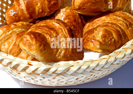 Basket with fresh croissants Stock Photo