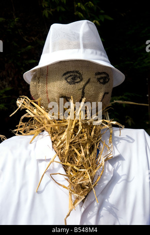 traditional derbyshire straw man scarecrow at festival time Stock Photo