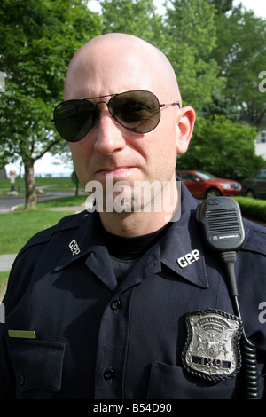 Police officer wearing uniform sunglasses hi-res stock photography and  images - Alamy