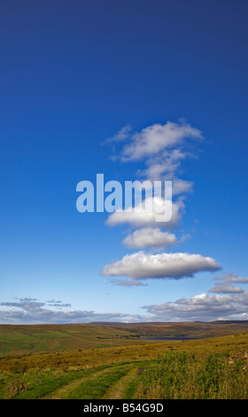 Cumulus clouds over Grimwith Reservoir near Hebden North Yorkshire Viewed looking northwards from B6265 east of Dibbles Bridge Stock Photo