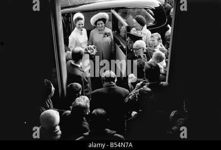 Arsenal centre half and Capt. of Northern Ireland world cup team Terry Neill had his hand full yesterday (Tues). His parcel was Stock Photo