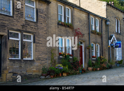 Village of Haworth in Yorkshire - cottages on the main street. Stock Photo