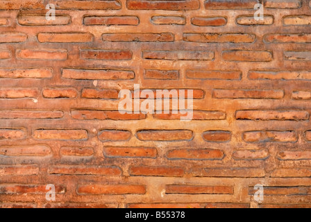 a ansient bricking wall in orange color Stock Photo