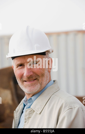Portrait of a construction engineer wearing a hardhat Stock Photo