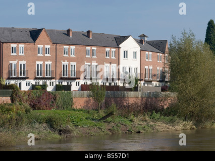 flats alongside a river Stock Photo