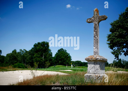 A golfer plays a hole on the Les Bordes golf course located in the Loire Valley, France Stock Photo