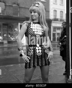 Actress Carol Dilworth will have no excuse for being late in 1968 she is wearing a dress made entirely from 50 giant pop watches January 1968 Y3 Stock Photo