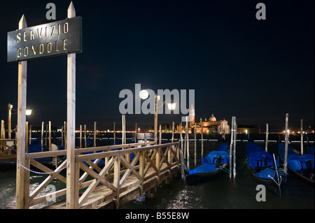 Gondolas at night looking towards San Giorgio Maggiore, San Marco district, Venice, Veneto, Italy Stock Photo