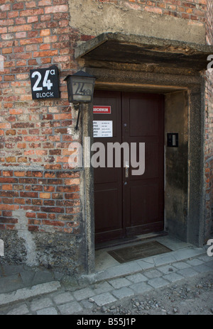 Entrance door to former block 24a in concentration camp Auschwitz I, currently used as an archive Stock Photo