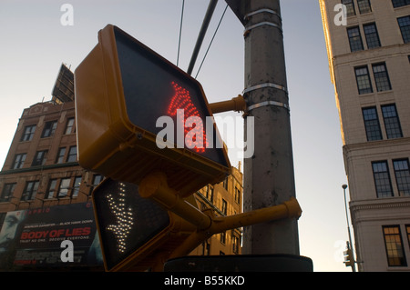 A damaged pedestrian walk don t walk sign on a street corner in New York on October 11 2008 Frances M Roberts Stock Photo