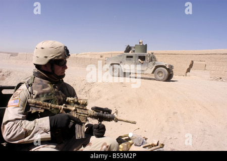 U.S. soldiers patrol through the town of Gardez, Paktia province, Afghanistan, October 2004. Stock Photo