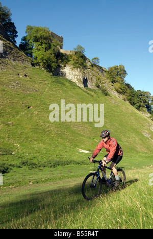 Doug Blane mountain biking Cavedale Castleton in the Peak District National Park Derbyshire UK England GB Great Britain Stock Photo