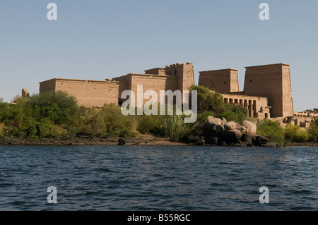 The temple of Isis from Philae at its current location on Agilkia Island in the reservoir of the Old Aswan Dam along the Nile River in southern Egypt Stock Photo