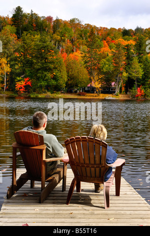 Couple relaxing on a lake Stock Photo