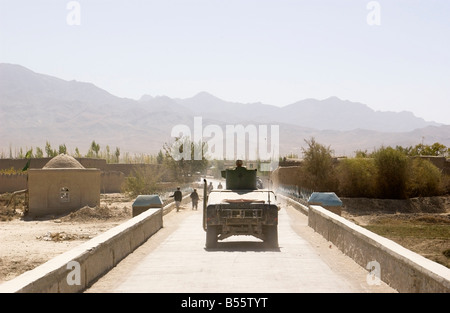 A U.S. humvee enters the town of Gardez, Paktia province, Afghanistan, October 2004. Stock Photo