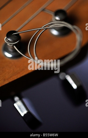 string and tuning keys on electric guitar Stock Photo