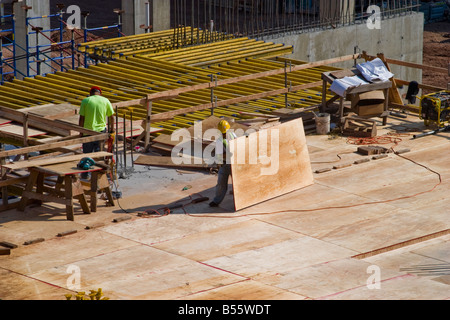 Workers at a construction site Stock Photo