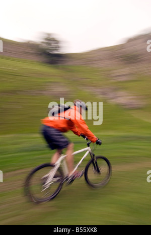 mountain biking Cavedale Castleton in the Peak District National Park Derbyshire UK England GB Great Britain Stock Photo