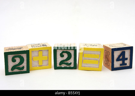 numbers on cubes 2 plus 2 makes 4 Stock Photo