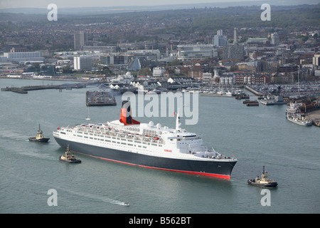 QE2, The Queen Elizabeth 2, Leaving Southampton on her final world cruise before retirement. Aerial photo. Stock Photo