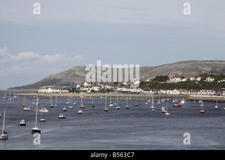 Boats Moored in Conwy Estuary Looking Towards The Great Orme Stock Photo