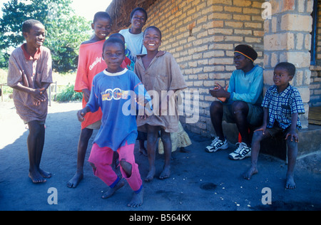 A young boy smiling in his Brazil T shirt. Likoma Island, Lake