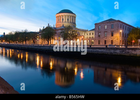 The Four Courts and the River Liffey in Dublin City by Night Stock Photo