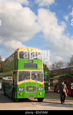 Old Bus and conductor at Sheffield Park Bluebell Railway Sussex England UK Stock Photo