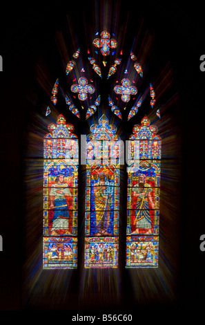 Zoom burst of a stained glass window in the Washington National Cathedral in Washington DC Stock Photo