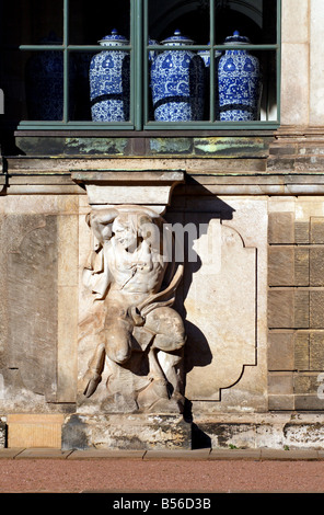 Detail of the historical Zwinger in Dresden, Germany with a satyr statue and porcelain vases Stock Photo