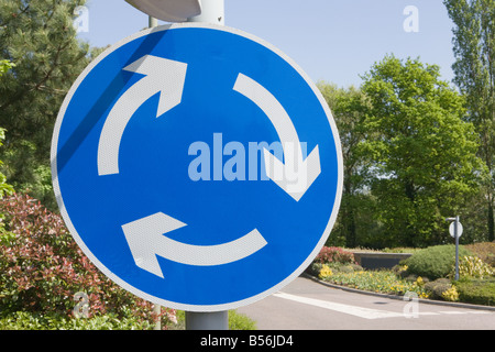 Blue traffic sign with a white arrow pointing up and an emergency Stock ...