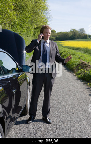 A man having automobile trouble Stock Photo