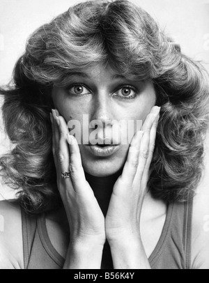 Beauty without surgery - facial exercises. Model Sara Jalkden. July 1980 P009176 Stock Photo