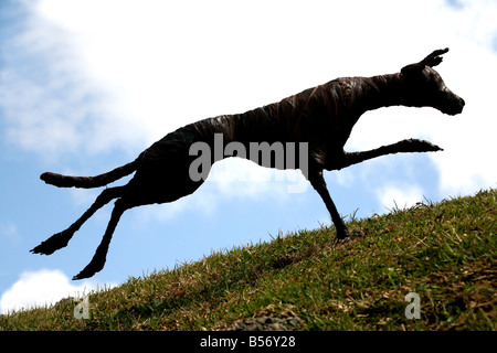 Dog Running Silhouette Stock Photo