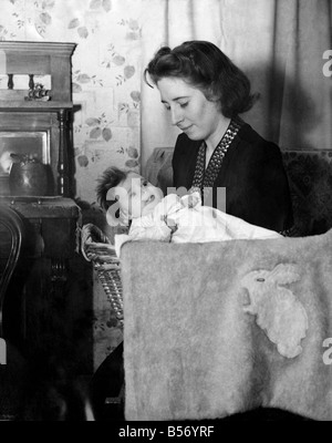 World war II Women: Domestic scene mother and children take a walk in ...