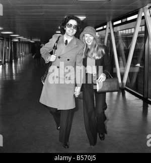 Singer songwriter Gilbert O' Sullivan at Heathrow today with Mary Terase. &#13;&#10;December 1974 &#13;&#10;74-7670 Stock Photo