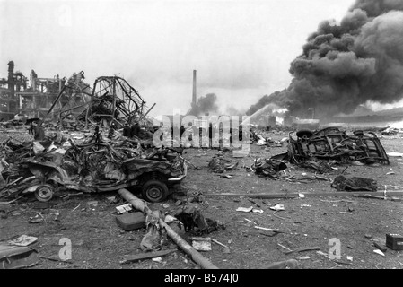 Disaster Blast At Flixborough: A massive blast ripped apart an entire village late on Saturday afternoon, 1st June 1974. At least 29 people died and 100 houses were wrecked when an explosion shook the Nypro chemical plant at the Lincolnshire village of Flixborough. 3,000 people were evacuated as firemen tried to prevent an escape of poisonous gas from ammonia tanks, seven miles away in Scunthorpe flying glass caused injuries and homes shook thirty miles away. The scene of devastation at Nypro works, Flixborough. June 1974 P004445 Stock Photo