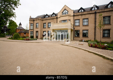 A modern extension to an old Victorian country house which is now a hotel and health club complex. Stock Photo