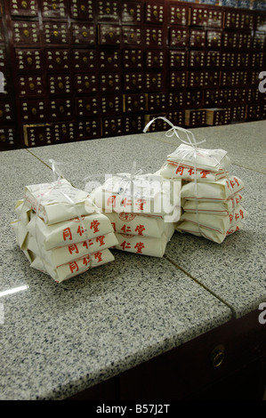 A Tong RenTang's client order is ready to go. Tong Ren Tang is the oldest pharmacy in Beijing.