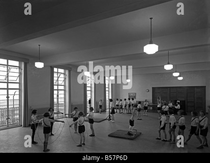 early-1950s-england-primary-school-children-acting-out-a-game-of