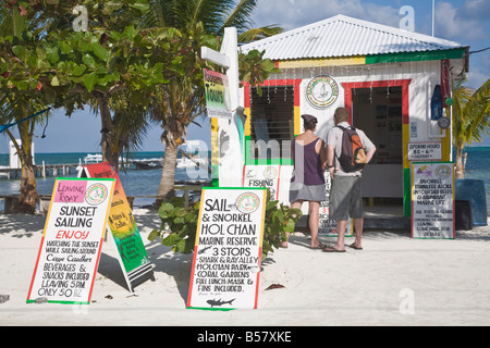 Raggamuffin Tours office on beach Caye Caulker Belize Central America Stock Photo