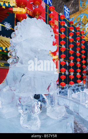 A lion statue ice sculpture at Longqing Gorge Ice sculpture festival, Beijing, China, Asia Stock Photo